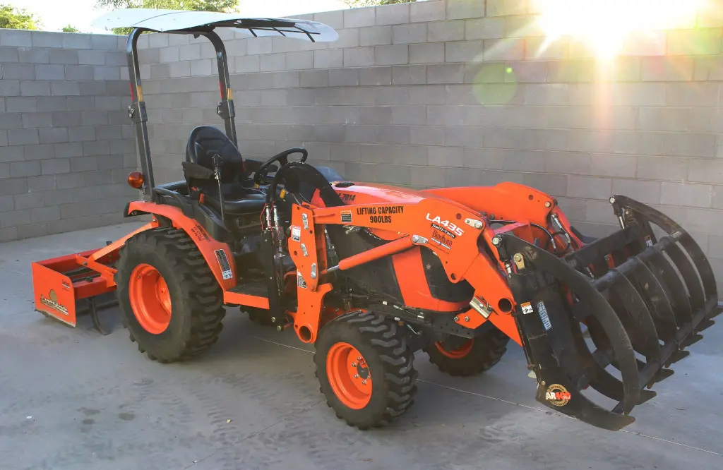 Kubota w/ Grappler Attachment